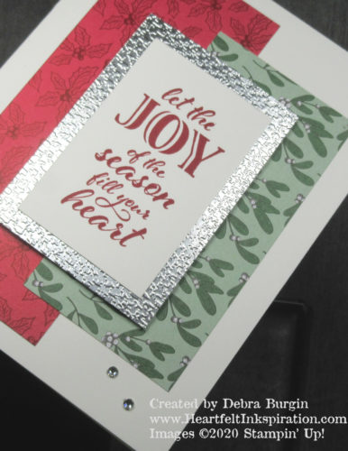 Wrapped in Christmas | Embossing Silver Foil paper adds a lot of glam to this card, and is a great substitute for glimmer paper.  Please click to read more! | Stampin' Up! | HeartfeltInkspiration.com | Debra Burgin