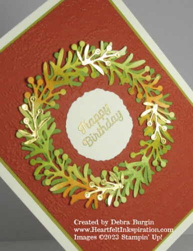 Wishes All Around | The hand-colored wreath is layered over a solid one for greater fullness.  Please click to read more! | Stampin' Up! | HeartfeltInkspiration.com | Debra Burgin  